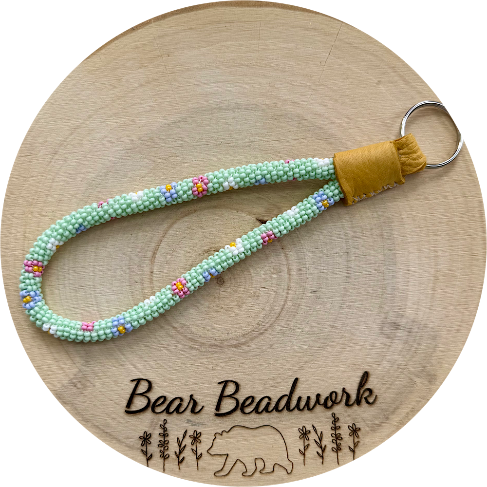 green floral mini wristlet